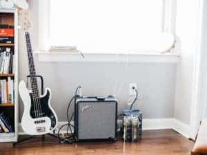 bass guitar and amp in living room
