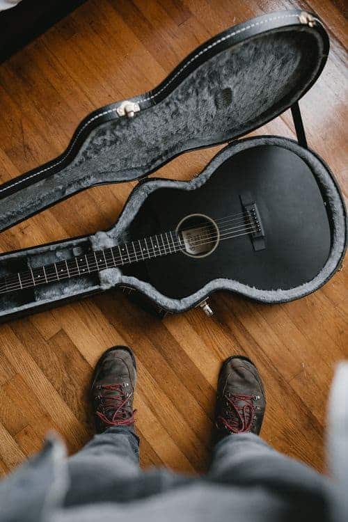 Guitar care tip showing a guitar in its case