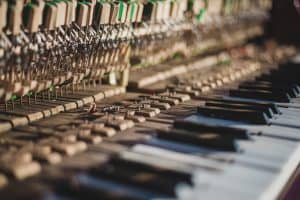 How to care for a piano: don't touch the insides of the piano