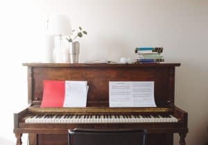 How to care for a piano: use mats for objects on top of a piano