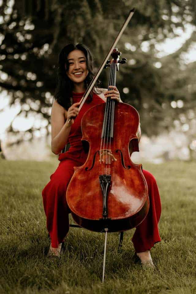 lady in red playing cello