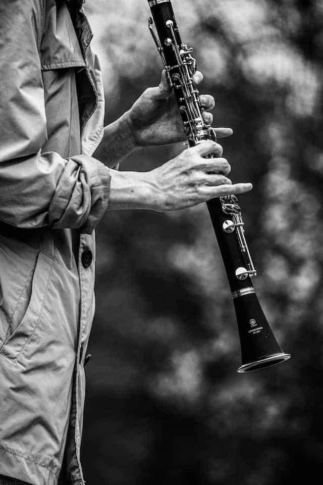man playing a clarinet