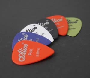 Several picks or plectrums on a table