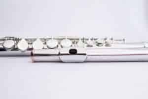 two parts of a flute on white