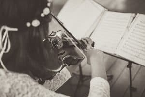 viola player reading music from a music stand