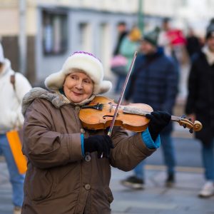 Lady having a lot of fun playing violin