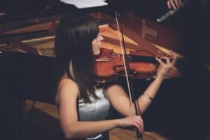 Professional violinist playing a concert